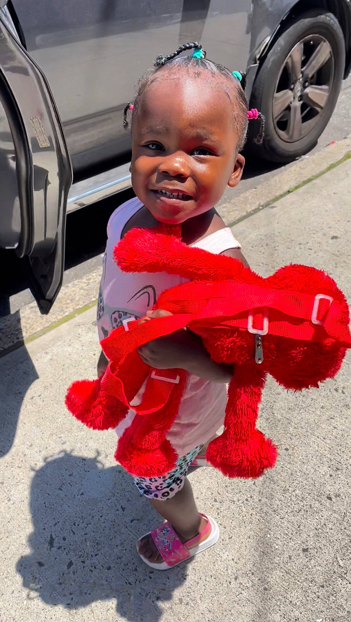 Aubrey joined the competition — help win amazing prizes! auto_part, automotive_exterior, automotive_tire, automotive_wheel_system, baby, baby_toddler_clothing, child, face, fun, happy, joy, magenta, motor_vehicle, person, pink, product, red, smile, tire, toddler