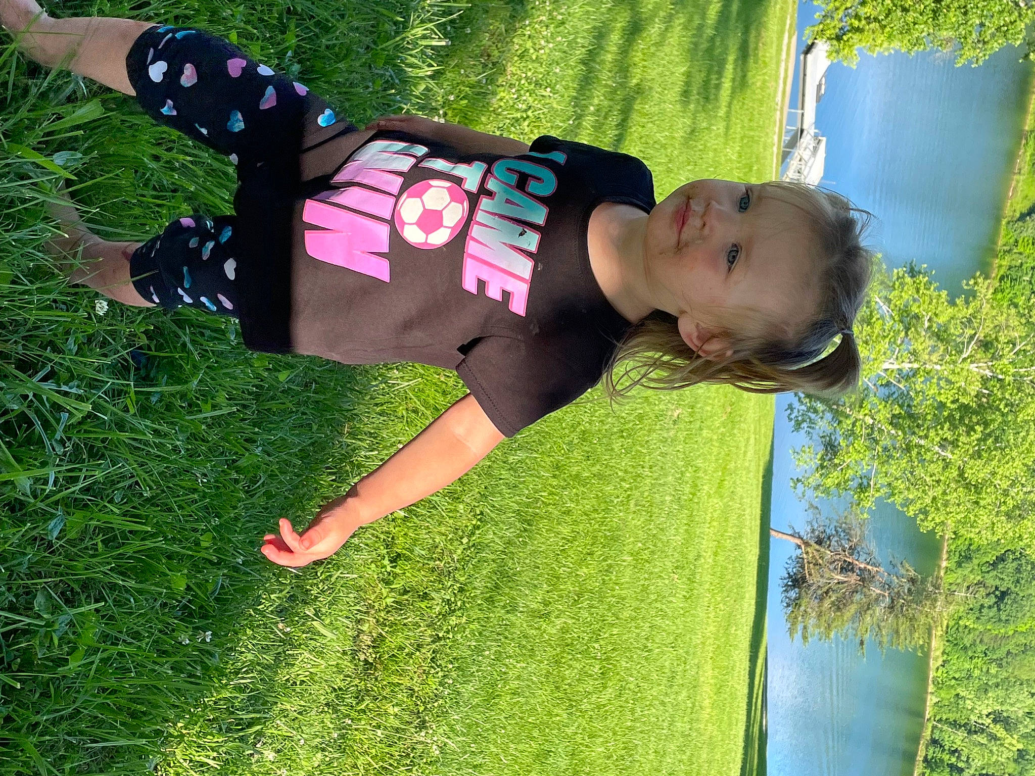 Jayde is registered to the contest to win money with this photo: child, fun, garden, grass, grass_family, grassland, green, happy, lawn, leaf, leisure, people_in_nature, person, plant, recreation, shrub, t_shirt, thigh, toddler, tree