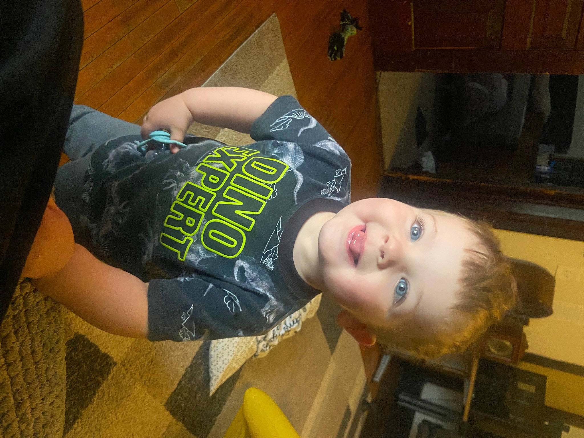 Kamden joined the competition — help win amazing prizes! cabinetry, child, elbow, flooring, fun, happy, human_leg, joy, kitchen_appliance, knee, pattern, person, room, sleeve, smile, t_shirt, thigh, toddler, wood, yellow