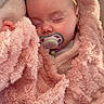 Amaya a rejoint le concours — aidez-le/la à gagner de superbes lots ! baby, blanket, child, closeup, comfort, cozy, cuddly, cute, face, indoors, infant, newborn, pacifier, peaceful, pink, portrait, rest, sleeping, soft, wrapped