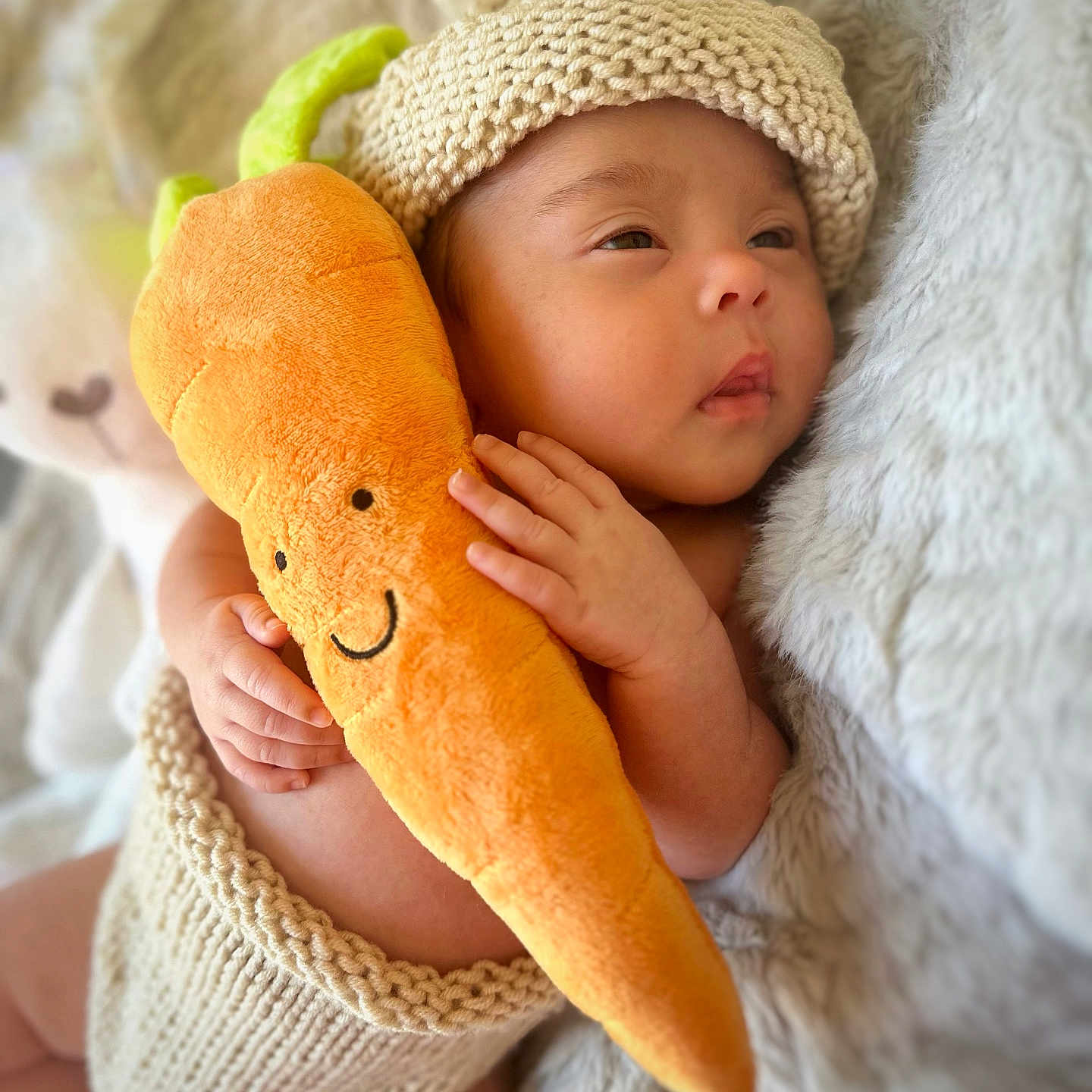 Liana Victoria is registered to the contest to win money with this photo: baby, beanie, bed, blanket, bodypart, bonnet, cap, clothing, cushion, face, finger, furniture, hand, hat, head, newborn, person, photography, portrait, sleeping