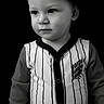 Isaiah is registered to the contest to win money with this photo: baby, background, black_and_white, child, cute, expression, face, fashion, headband, innocence, isolated, long_sleeves, monochrome, person, portrait, standing, striped_clothing, studio, toddler, young