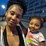Meilanilee joined the competition — help win amazing prizes! woman, toddler, selfie, outdoor, boardwalk, evening, streetlamp, cityscape, building, smile, portrait, child, person, hair, clothing, urban, light, happy, family, casual