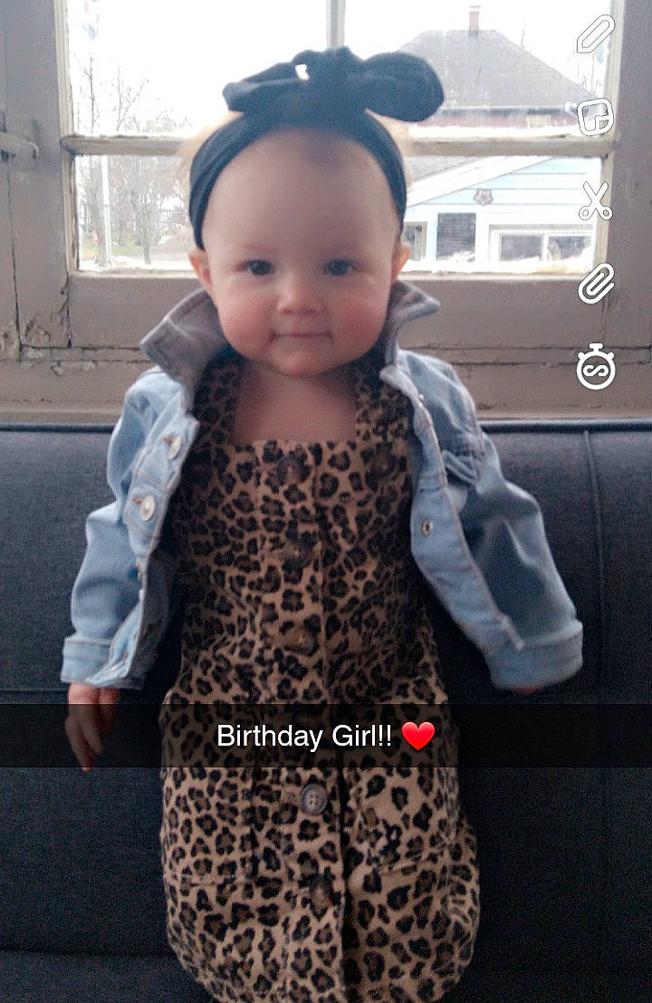 Aleena joined the competition — help win amazing prizes! baby, baby_toddler_clothing, child_model, costume_accessory, day_dress, hair_accessory, hair_tie, headband, headpiece, one_piece_garment, pattern, person, toddler, window, window_covering, window_treatment