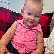 Maeslley is registered to the contest to win money with this photo: architecture, baby, building, clothing, couch, cushion, face, furniture, happy, head, homedecor, indoors, livingroom, pants, person, photography, portrait, room, sitting, t_shirt