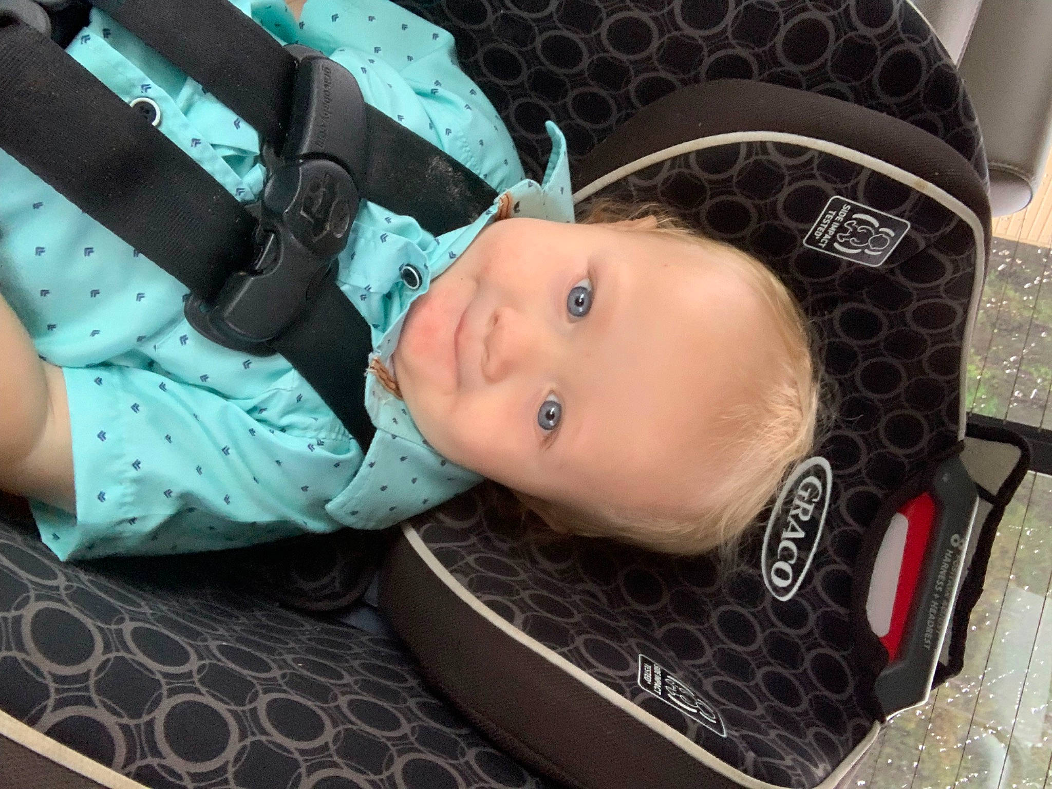Kam is registered to the contest to win money with this photo: auto_part, baby, baby_carriage, baby_products, baby_safety, baby_toddler_clothing, car_seat, cheek, child, comfort, eyelash, fashion_accessory, hat, joy, pattern, person, personal_protective_equipment, sitting, toddler