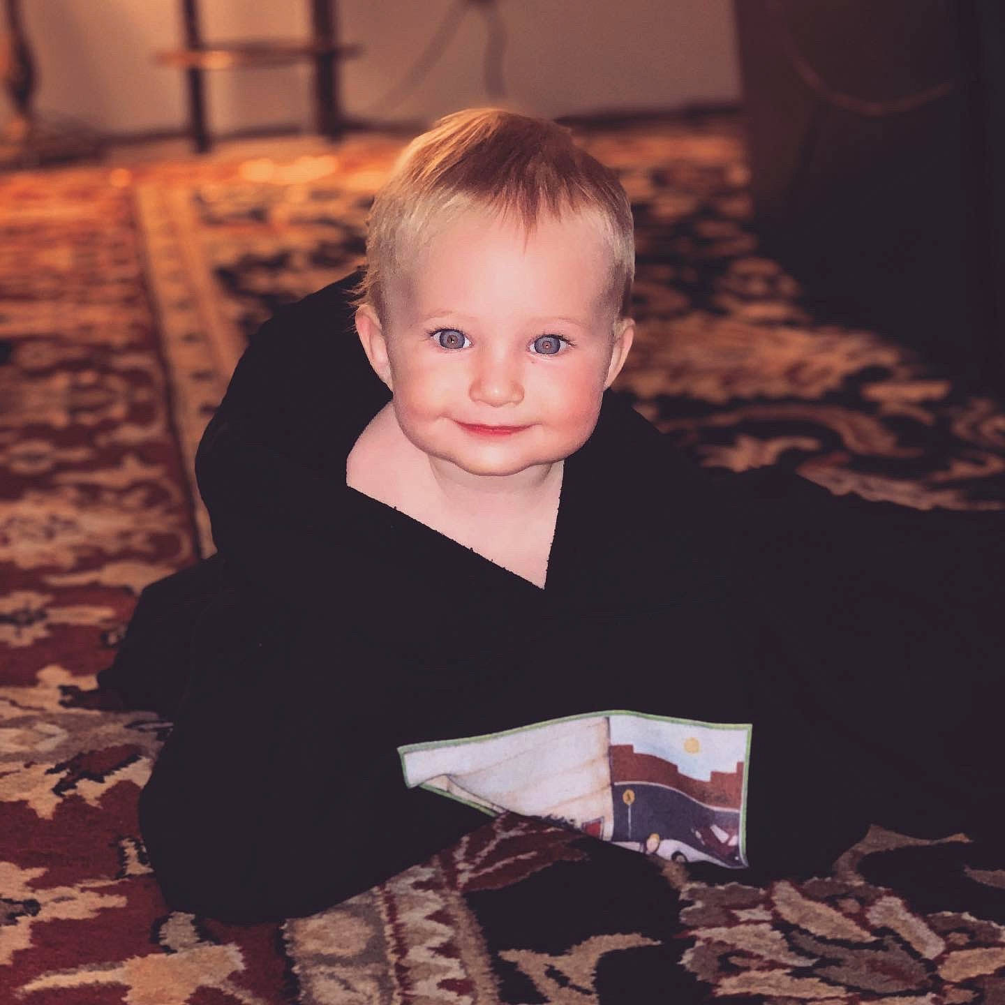 Theotiste joined the competition — help win amazing prizes! baby, baby_toddler_clothing, carpet, cheek, child, dress, flash_photography, flooring, formal_wear, fun, happy, joy, linens, person, portrait_photography, room, sitting, sleeve, smile, t_shirt