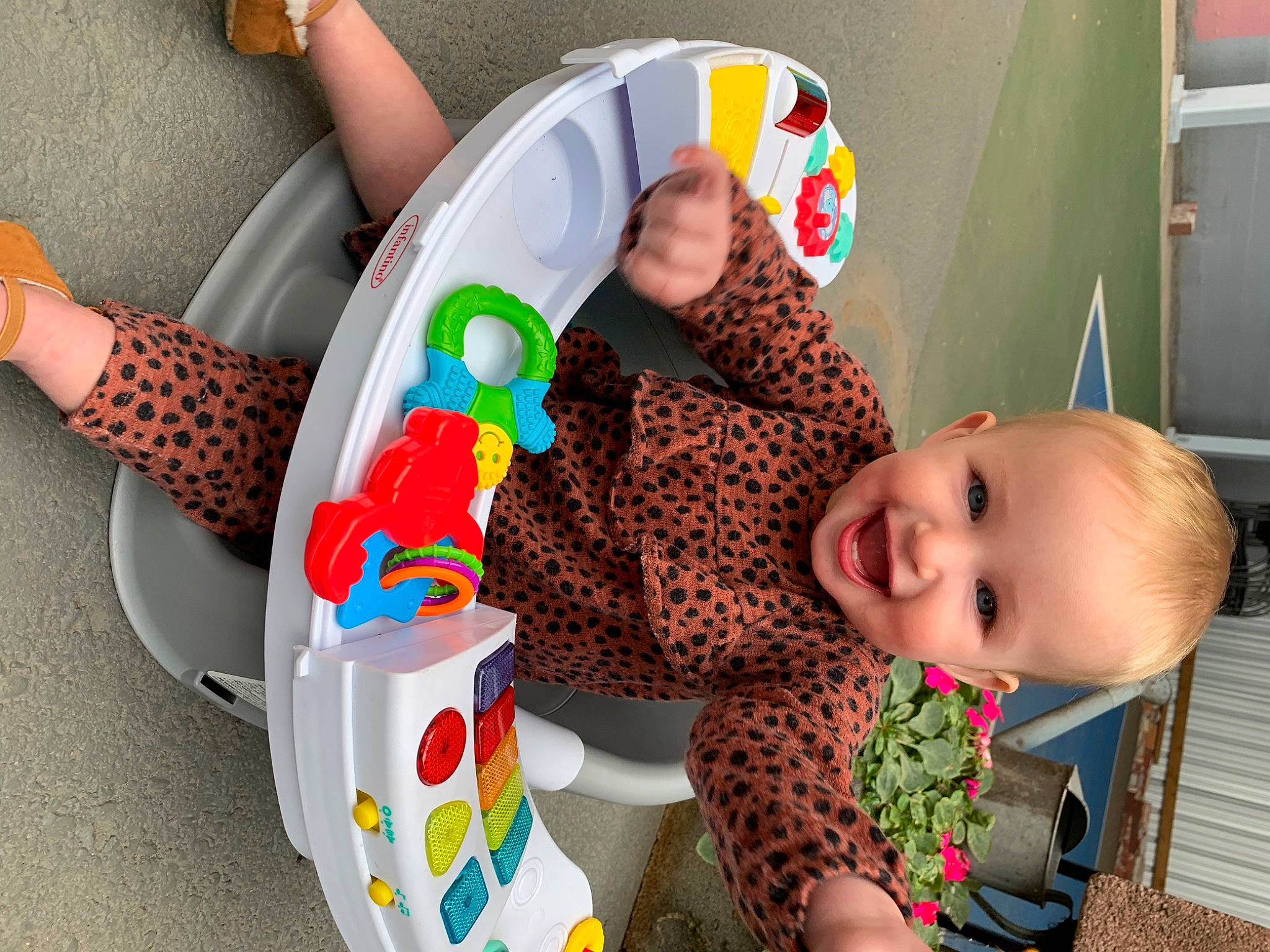 Theotiste is registered to the contest to win money with this photo: baby, baby_playing_with_toys, baby_products, baby_toddler_clothing, baby_toys, child, circle, comfort, drinkware, flooring, fun, happy, pattern, person, plastic, play, room, sitting, smile, toddler
