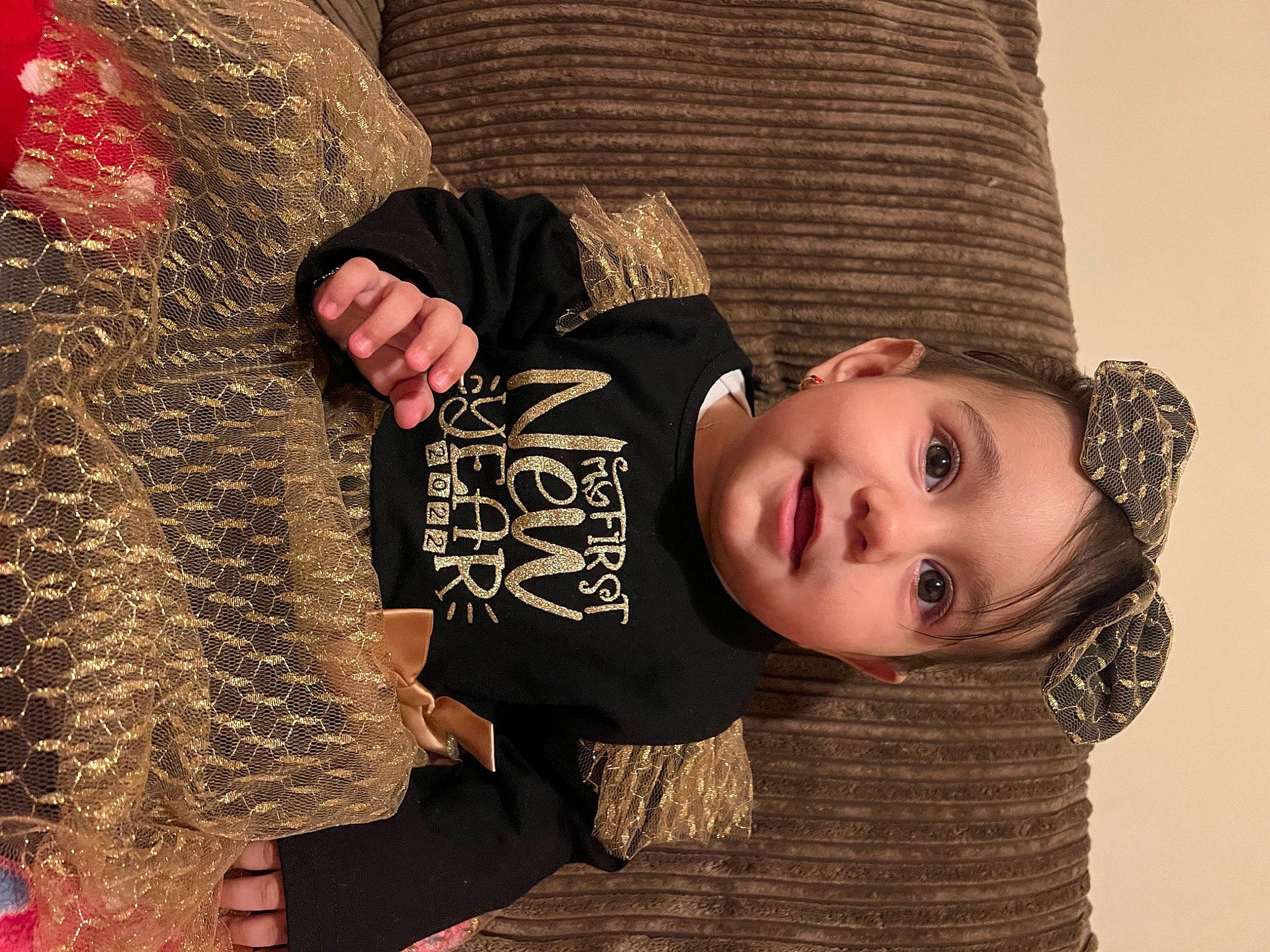 Patricia Nicoleta is registered to the contest to win money with this photo: baby_toddler_clothing, child, event, fashion_accessory, flash_photography, fun, fur, happy, hat, holiday, pattern, people, person, portrait_photography, room, sitting, sleeve, sun_hat, textile, toddler