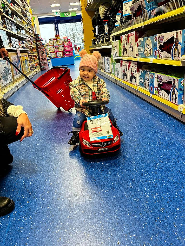 Patricia Nicoleta joined the competition — help win amazing prizes! asphalt, automotive_design, automotive_exterior, bumper, child, customer, event, flooring, fun, headwear, leisure, luggage_and_bags, mode_of_transport, motor_vehicle, person, publication, recreation, retail, riding_toy, shelf