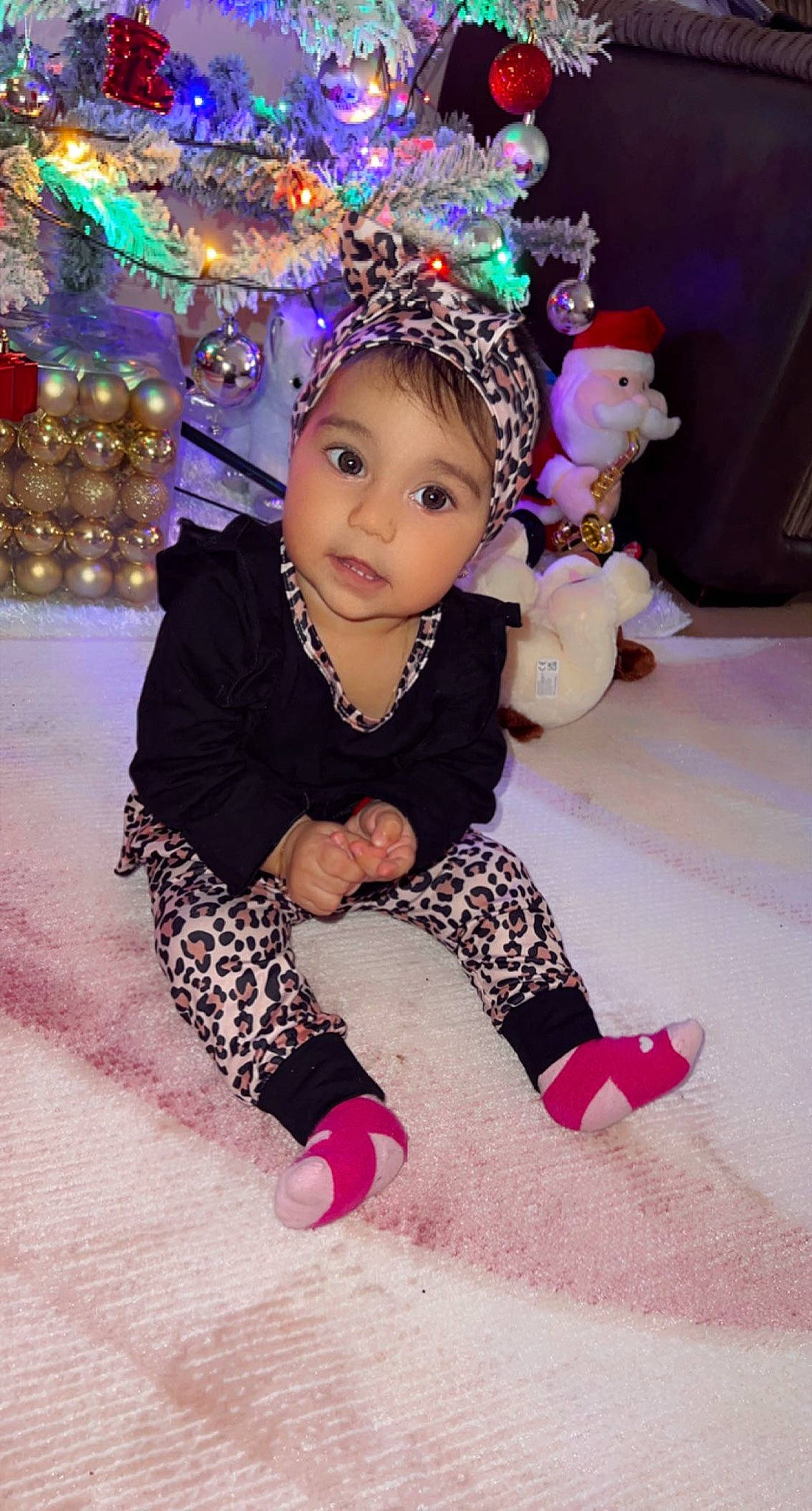 Patricia Nicoleta is registered to the contest to win money with this photo: child, christmas, christmas_eve, event, fashion, fashion_accessory, fashion_design, fun, happy, headpiece, holiday, jewellery, magenta, ornament, party_supply, person, pink, purple, sitting, toddler