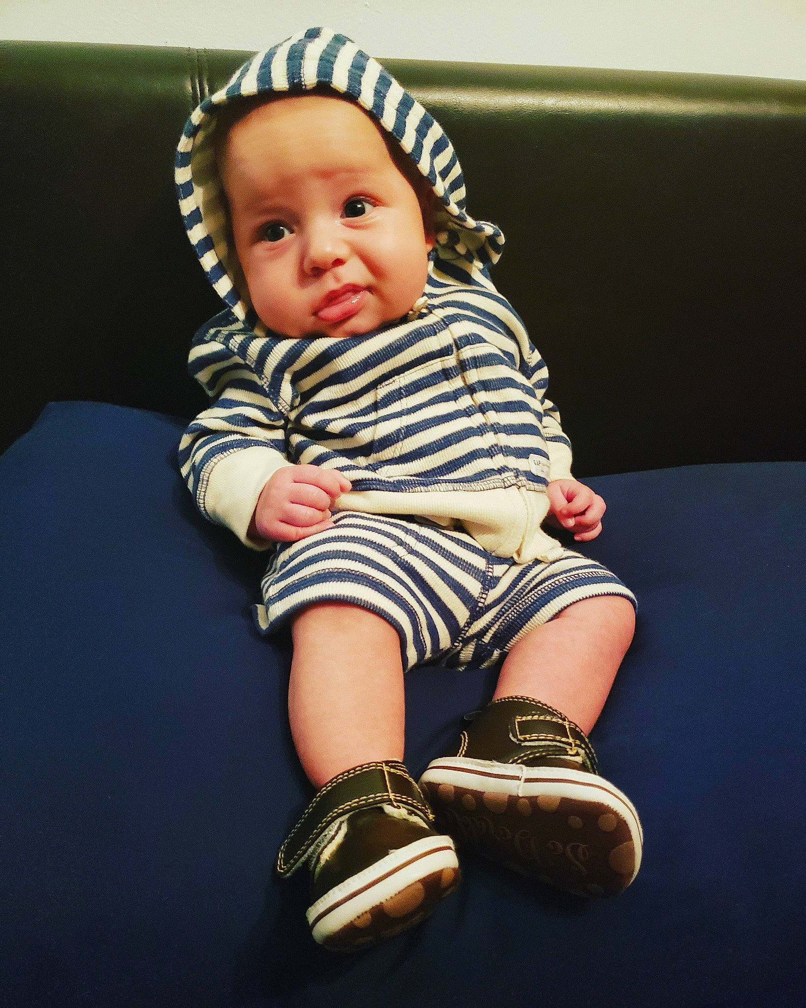 Sami joined the competition — help win amazing prizes! baby, baby_toddler_clothing, cheek, child, child_model, face, fashion_accessory, flash_photography, head, headgear, person, photography, shoe, sitting, skin, smile, toddler