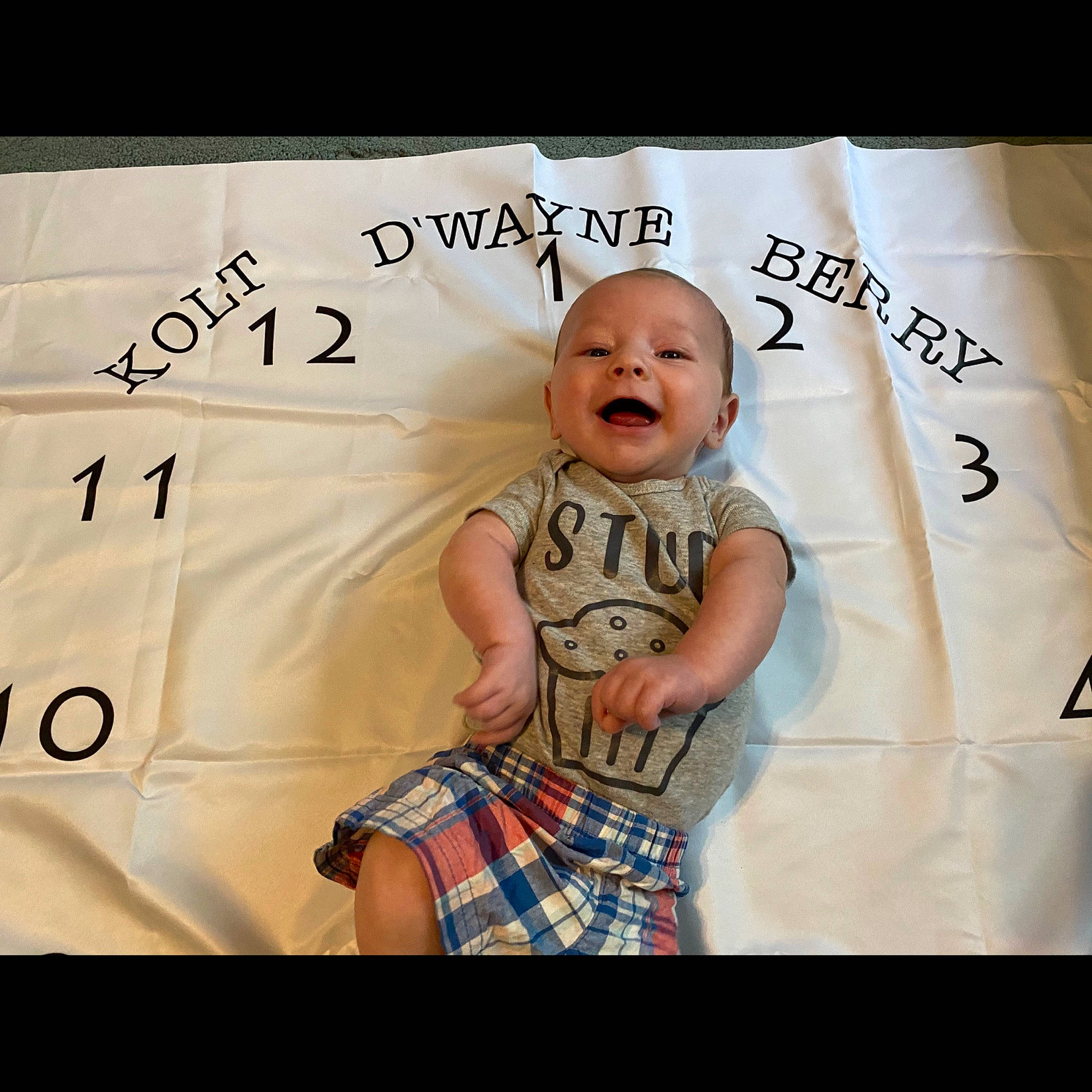 Kolt is registered to the contest to win money with this photo: baby, child, cool, design, facial_expression, finger, font, hand, happy, human, laugh, love, pattern, person, photo_caption, photography, play, product, smile, t_shirt