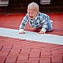 Seanpaul is registered to the contest to win money with this photo: toddler, child, crying, outdoor, pavement, red_brick, checkered_shirt, hands, face, emotion, upset, bench, brick_wall, clothing, person, distress, young_child, expression, kneeling, casual