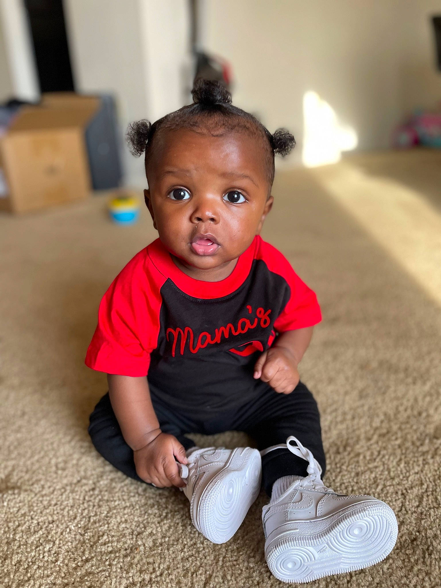Zaiden is registered to the contest to win money with this photo: baby, baby_toddler_clothing, cheek, child, flash_photography, floor, flooring, fun, grass, happy, hardwood, human_leg, leisure, person, sitting, skin, sleeve, t_shirt, toddler, walking_shoe