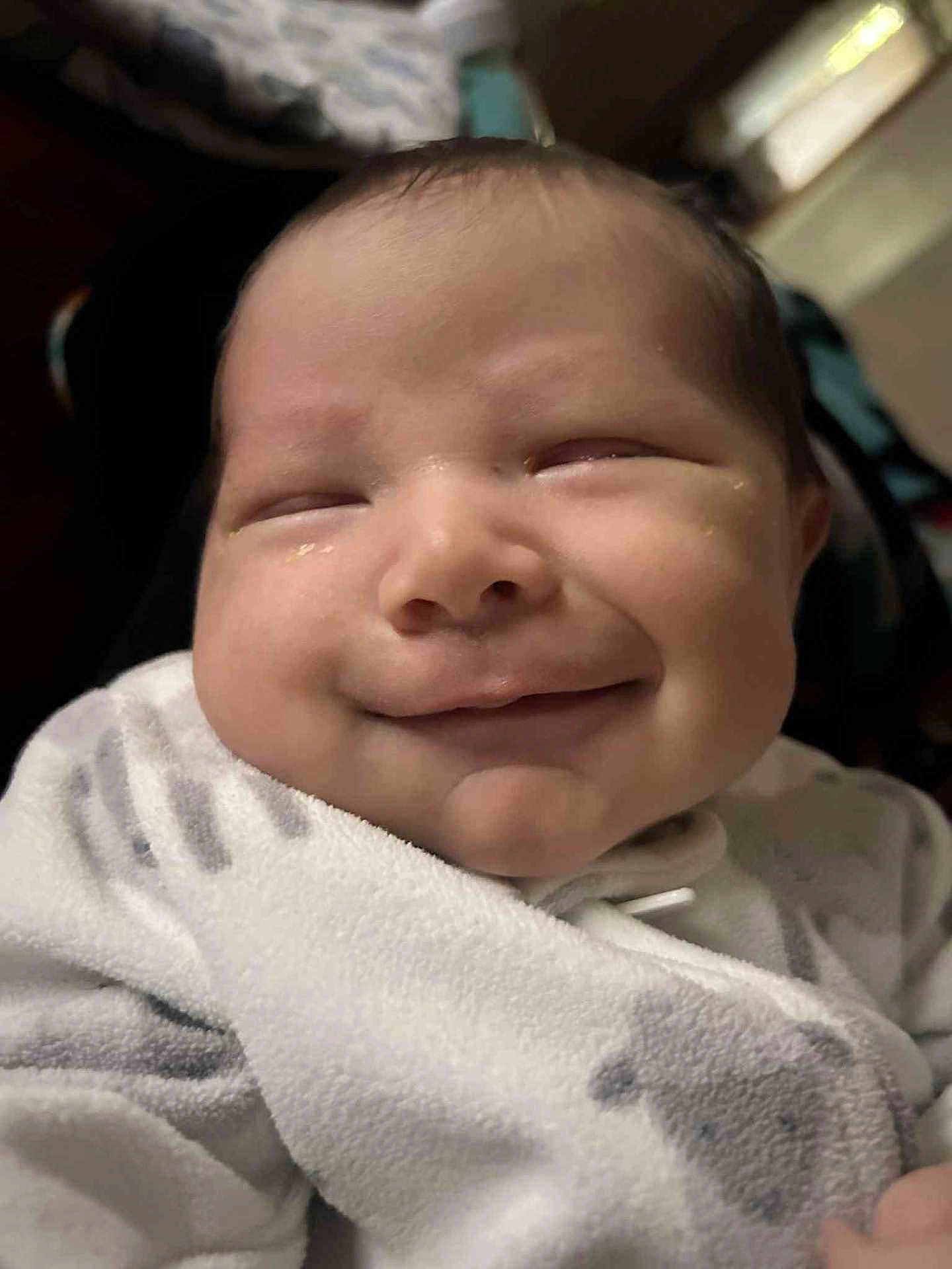 Julius joined the competition — help win amazing prizes! baby, smile, face, blanket, infant, closeup, soft, wrapped, cheeks, peaceful, cute, newborn, sleepy, indoors, child, person, cozy, expression, comfort, adorable