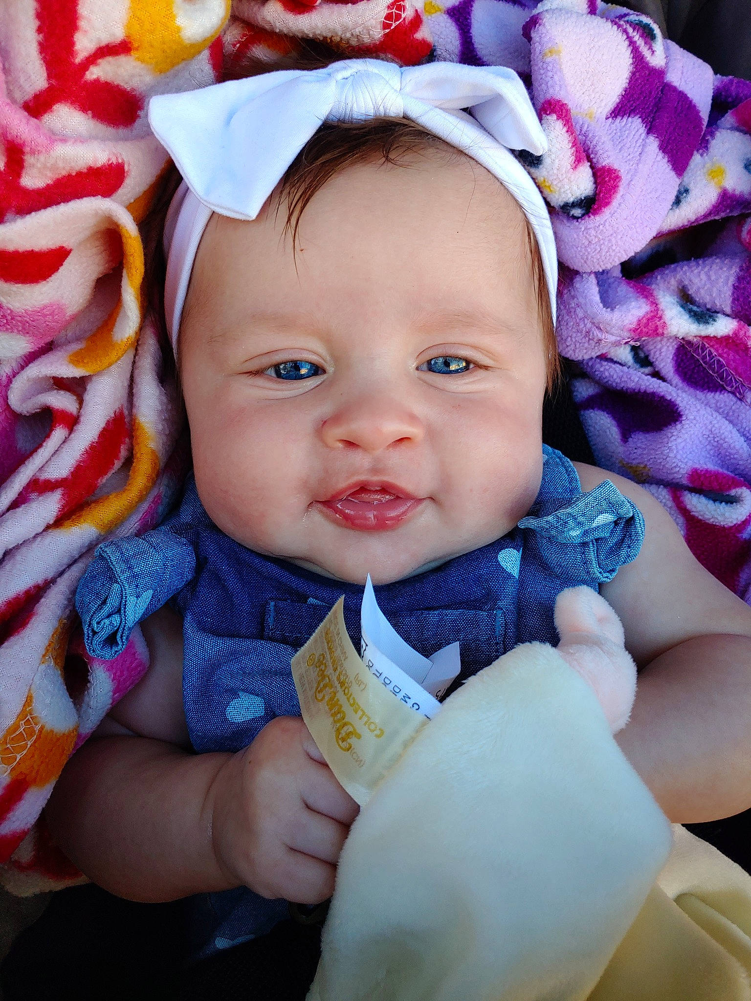 Kenzi is registered to the contest to win money with this photo: baby, baby_products, cheek, child, eye, face, hair_accessory, head, lip, person, pink, product, skin, smile, toddler