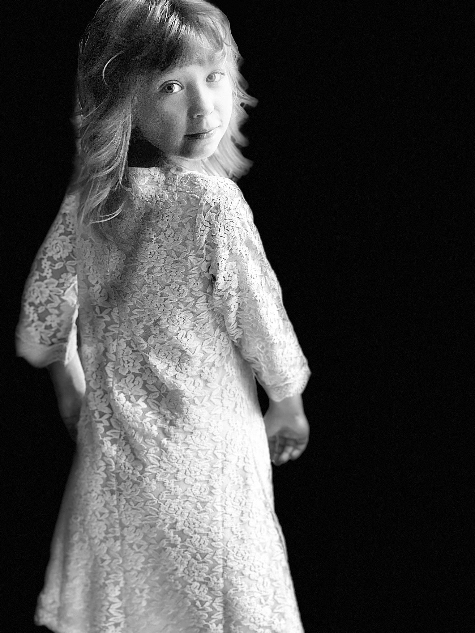 Lexie is registered to the contest to win money with this photo: black_and_white, doll, dress, eye, eyelash, fashion_design, flash_photography, gesture, grey, hairstyle, iris, lip, long_hair, monochrome_photography, one_piece_garment, person, skin, sleeve, style, toy