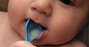 Lorenzo joined the competition — help win amazing prizes! baby, infant, spoon, hand, chewing, face, skin, curious, closeup, mouth, blue, cute, chubby, expression, indoor, child, young, portrait, person, soft
