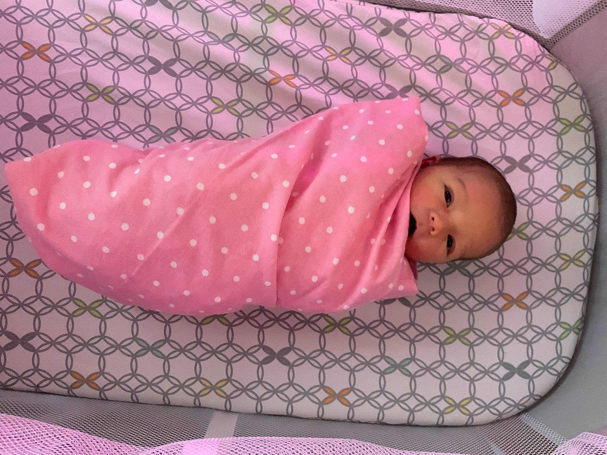Everlee is registered to the contest to win money with this photo: baby, baby_products, baby_safety, baby_sleeping, baby_toddler_clothing, baby_toys, bedding, child, comfort, infant_bed, linens, magenta, nap, pattern, person, pink, polka_dot, rectangle, room, sleep