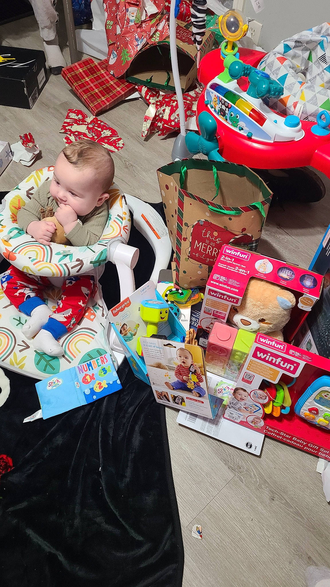 Elijah joined the competition — help win amazing prizes! bag, carmine, child, christmas, christmas_eve, event, fashion_accessory, flea_market, gift_wrapping, holiday, linens, market, pattern, person, plastic, present, product, public_space, room, selling
