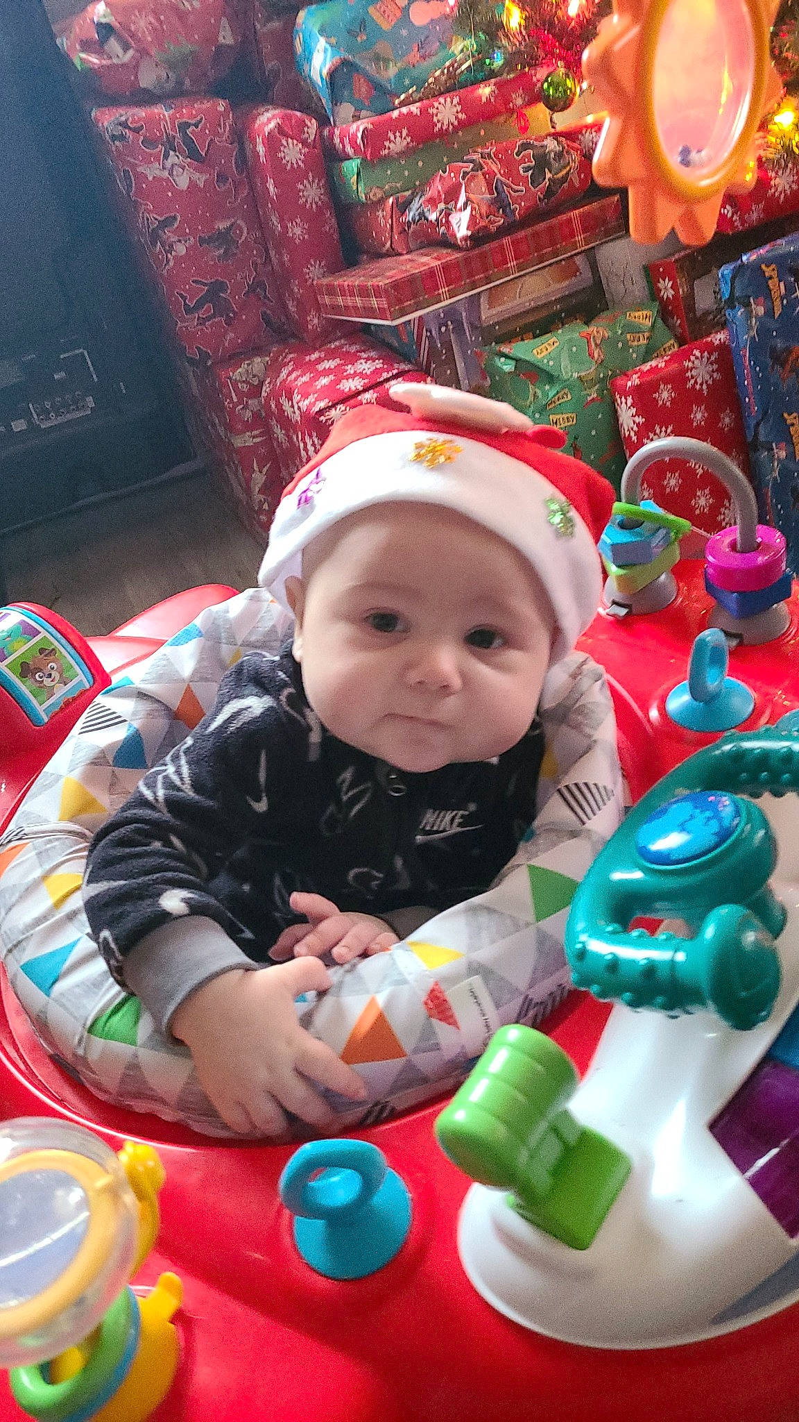 Elijah joined the competition — help win amazing prizes! baby, baby_products, baby_toddler_clothing, baby_toys, child, couch, event, fictional_character, fun, happy, head, headwear, holiday, leisure, person, plastic, play, product, red, room
