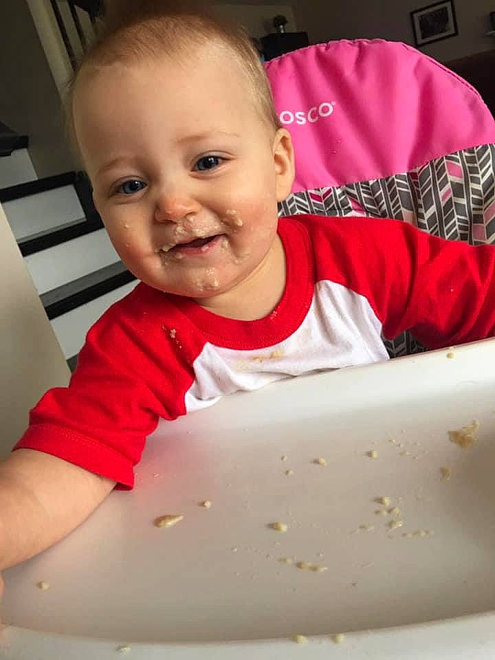 Adalene is registered to the contest to win money with this photo: arm, baby, baby_toddler_clothing, cheek, child, chin, drinkware, eyebrow, face, finger, fun, happy, joy, mouth, nose, person, skin, sleeve, smile, t_shirt