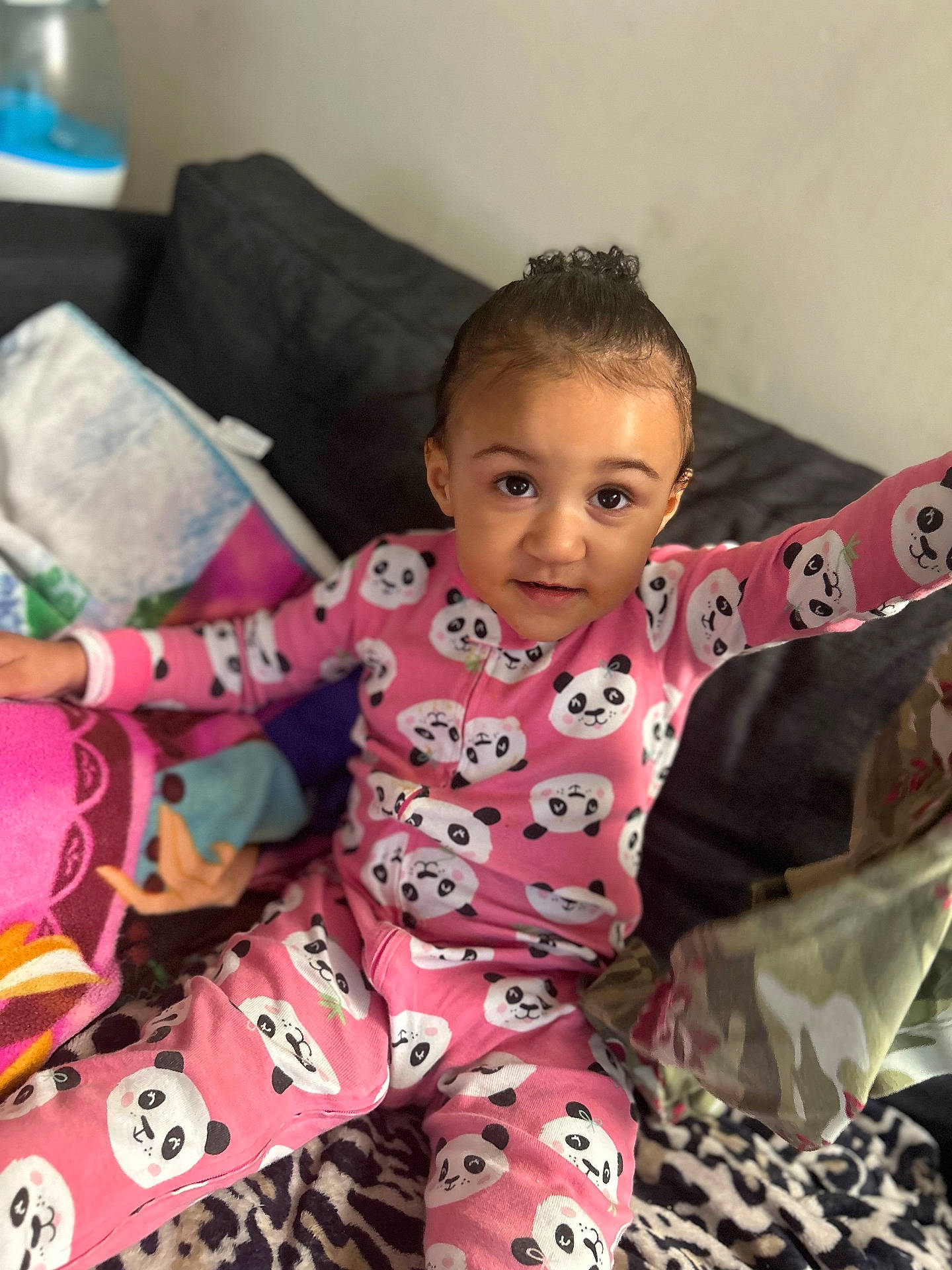 Hope is registered to the contest to win money with this photo: baby, clothing, cushion, face, hair, happy, head, homedecor, pajamas, person, photography, portrait, sitting, sleeve, smile