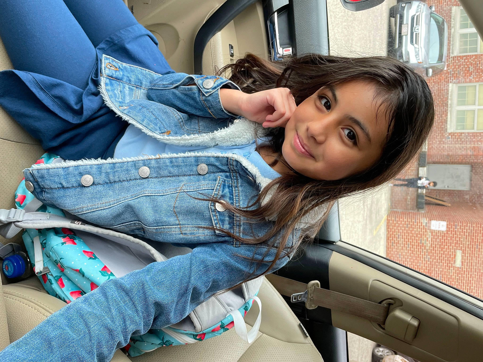 Zuley is registered to the contest to win money with this photo: auto_part, automotive_design, automotive_exterior, black_hair, car, denim, electric_blue, human_leg, joy, long_hair, motor_vehicle, person, personal_luxury_car, snapshot, steering_wheel, street_fashion, thigh, travel, vehicle_door, waist