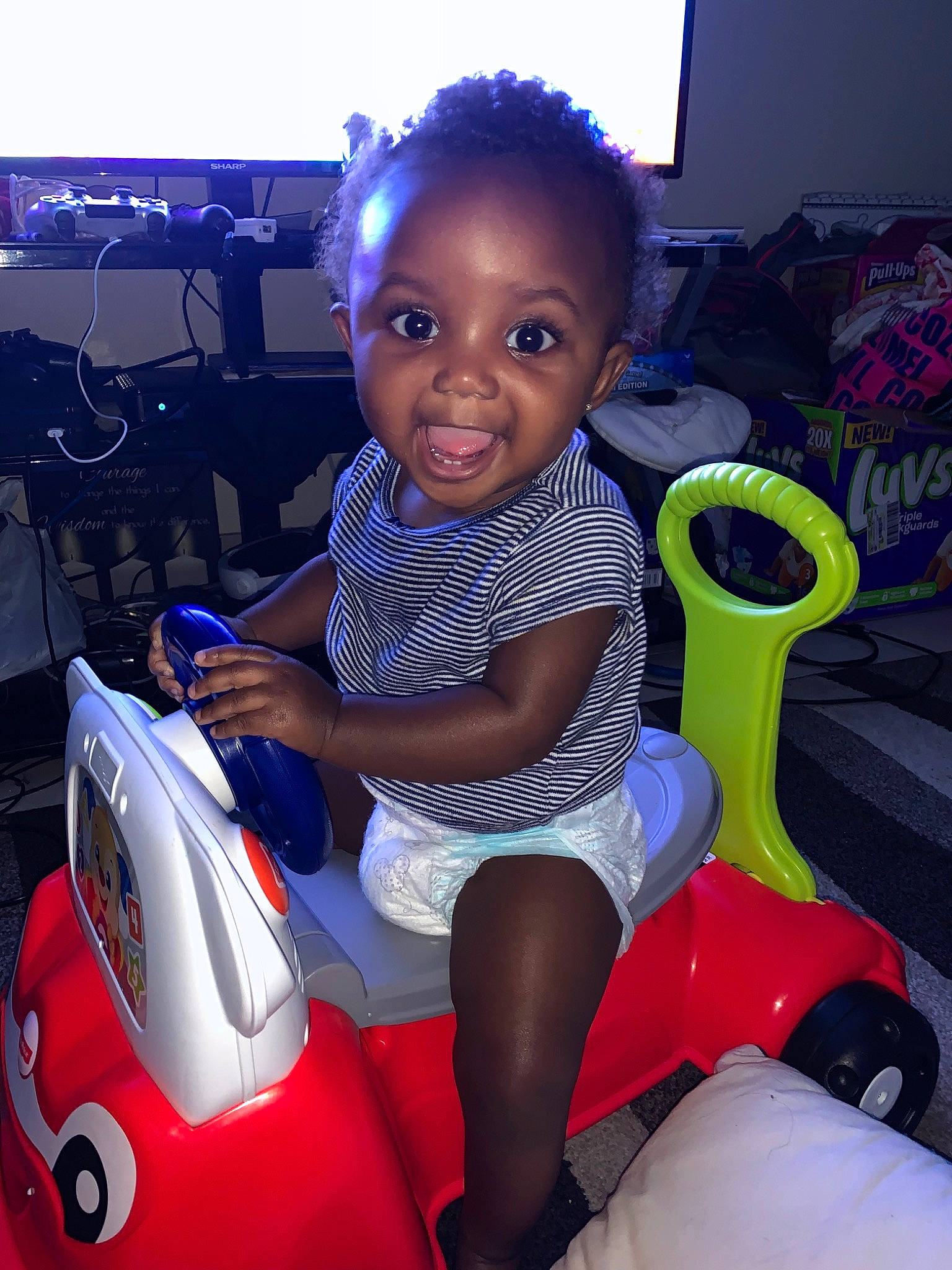 Jniya joined the competition — help win amazing prizes! child, fun, hairstyle, joy, person, play, sitting, smile, toddler, vehicle