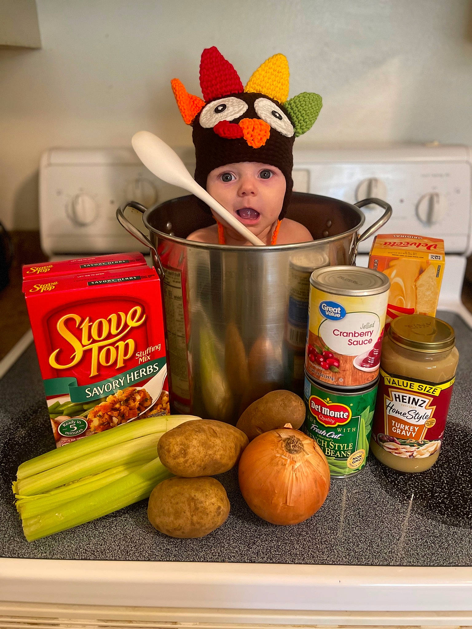 Lennox is registered to the contest to win money with this photo: canning, comfort_food, cuisine, dish, food, food_group, food_storage, food_storage_containers, headwear, ingredient, junk_food, kitchen, local_food, natural_foods, person, preserved_food, room, surprise, vegan_nutrition, vegetable