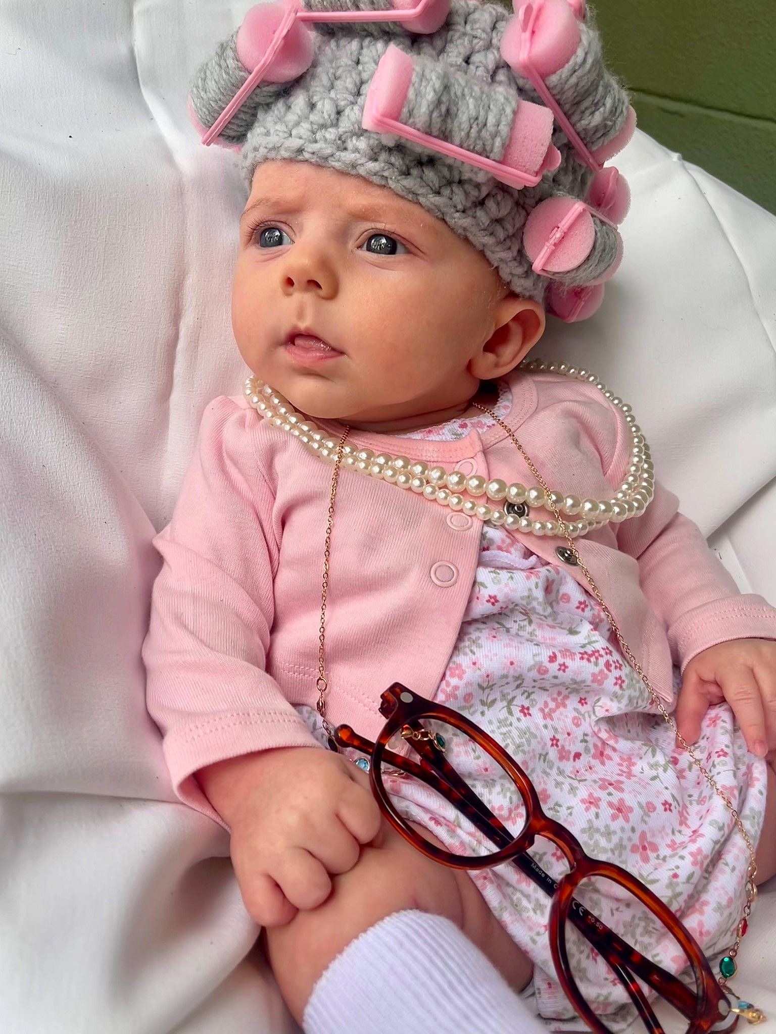 Lennox is registered to the contest to win money with this photo: baby, baby_toddler_clothing, cap, cheek, child, cool, eye, eyelash, face, happy, headgear, headwear, lip, magenta, person, pink, skin, sleeve, sun_hat, textile