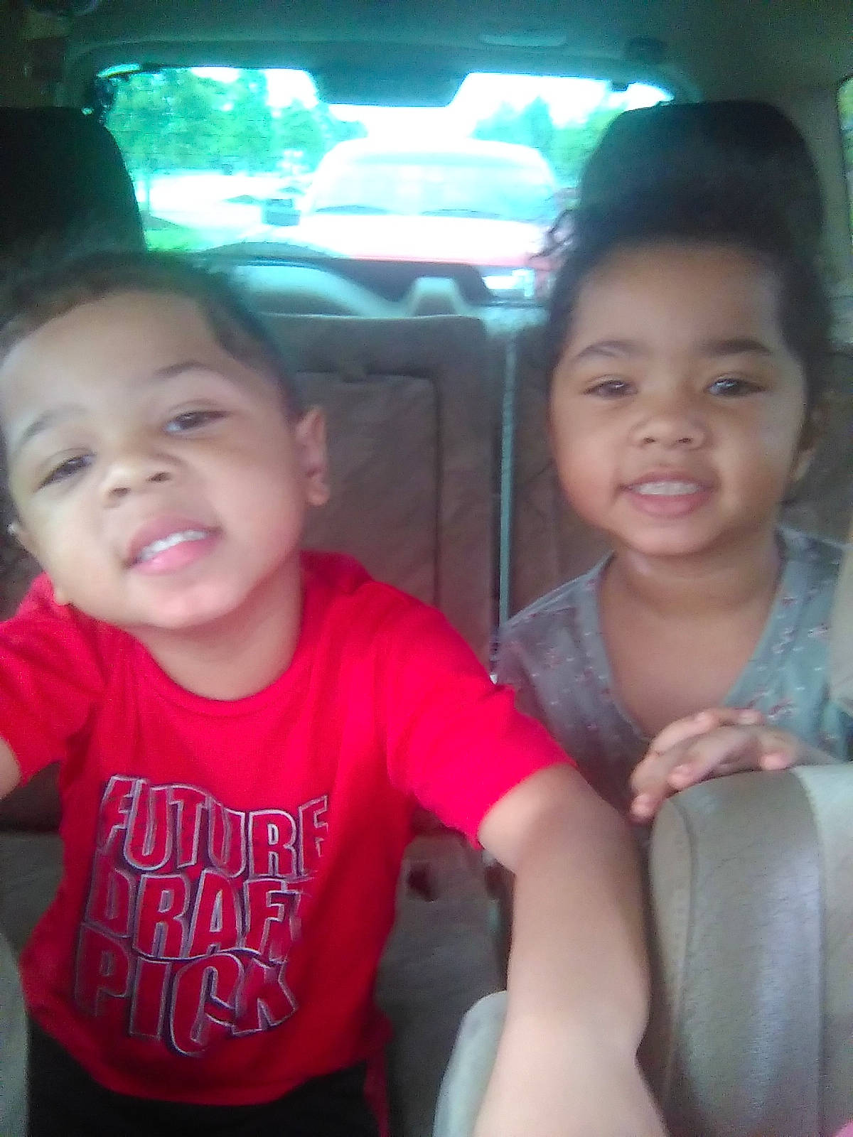 Raelynn joined the competition — help win amazing prizes! baby_toddler_clothing, car, chin, cool, eye, face, facial_expression, fun, gesture, happy, head, human, mammal, mouth, nose, organ, person, skin, smile, toddler