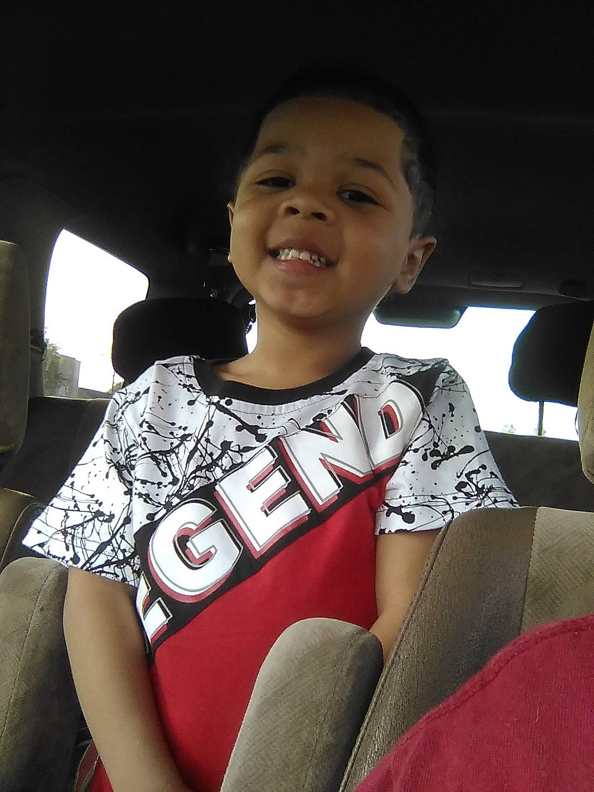 Bryson joined the competition — help win amazing prizes! automotive_design, black_hair, chin, comfort, cool, facial_expression, finger, flash_photography, happy, head, human_body, joy, lip, motor_vehicle, mouth, neck, person, shoulder, sleeve, smile