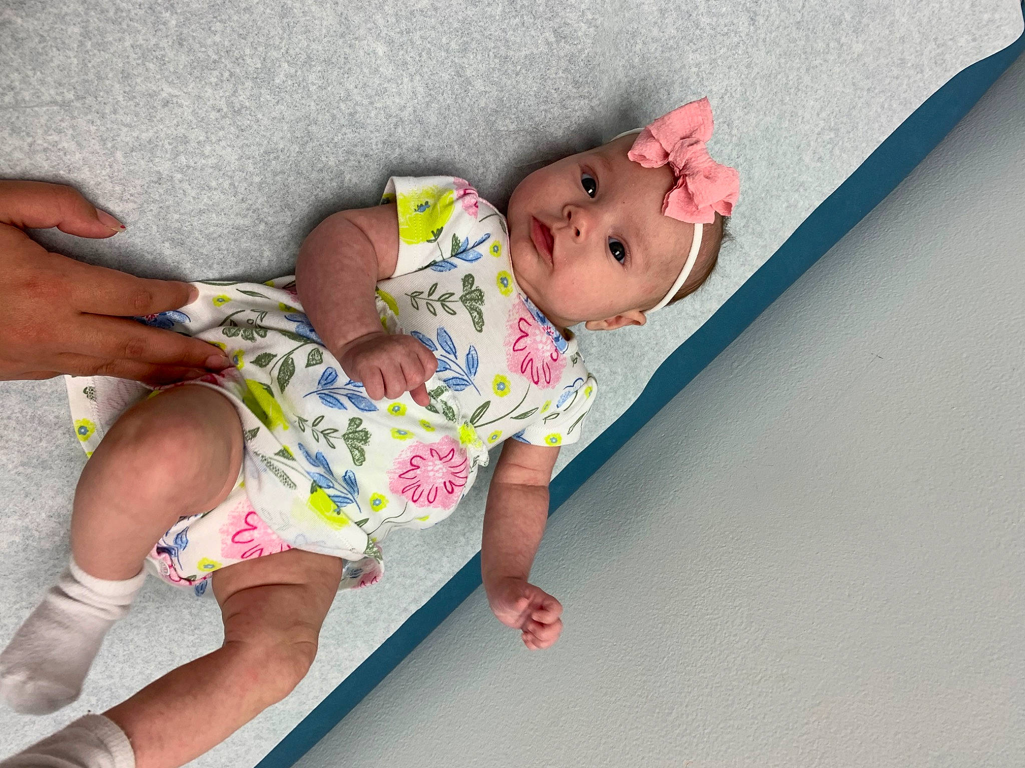 Mariana is registered to the contest to win money with this photo: baby, baby_toddler_clothing, barefoot, cheek, child, comfort, flooring, foot, fun, headwear, human_leg, joint, leg, person, pink, product, shorts, skin, sleeve, textile