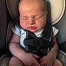baby, infant, sleeping, car_seat, seatbelt, harness, portrait, face, eyes_closed, indoors, vehicle, sitting, hands, arms, legs, clothing, white_shirt, cozy, photography, child