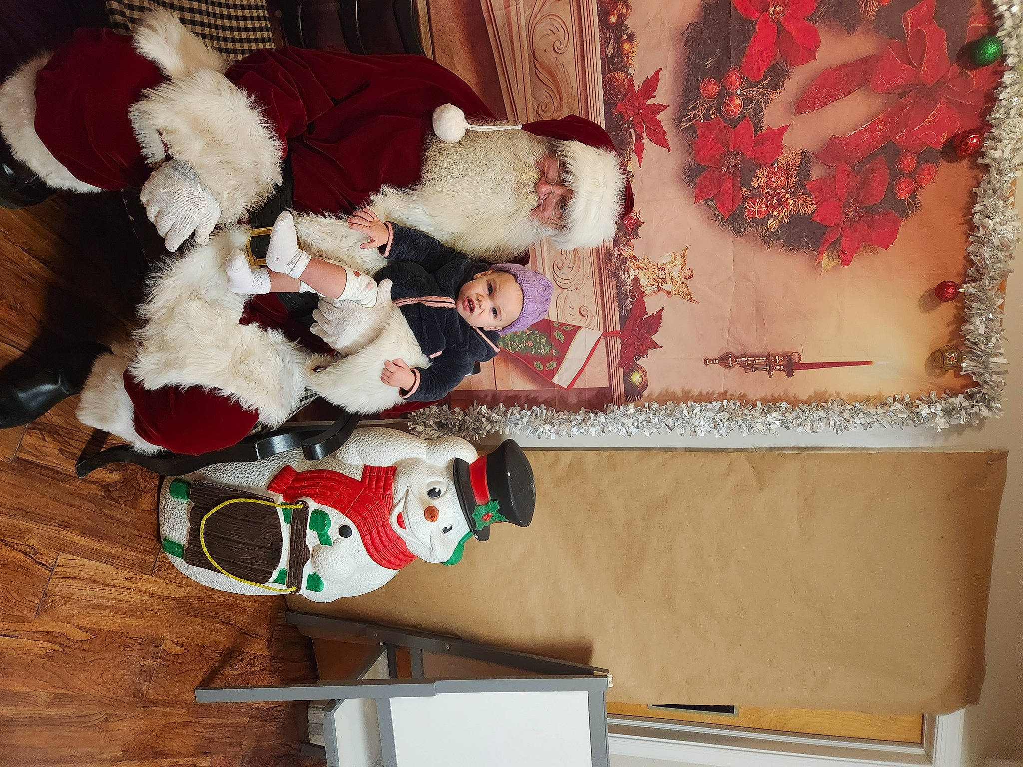 Alyvia is registered to the contest to win money with this photo: art, carmine, collection, companion_dog, curtain, embellishment, event, fur, hardwood, headwear, holiday, pattern, peach, person, red, room, rose, santa_claus, stuffed_toy, textile