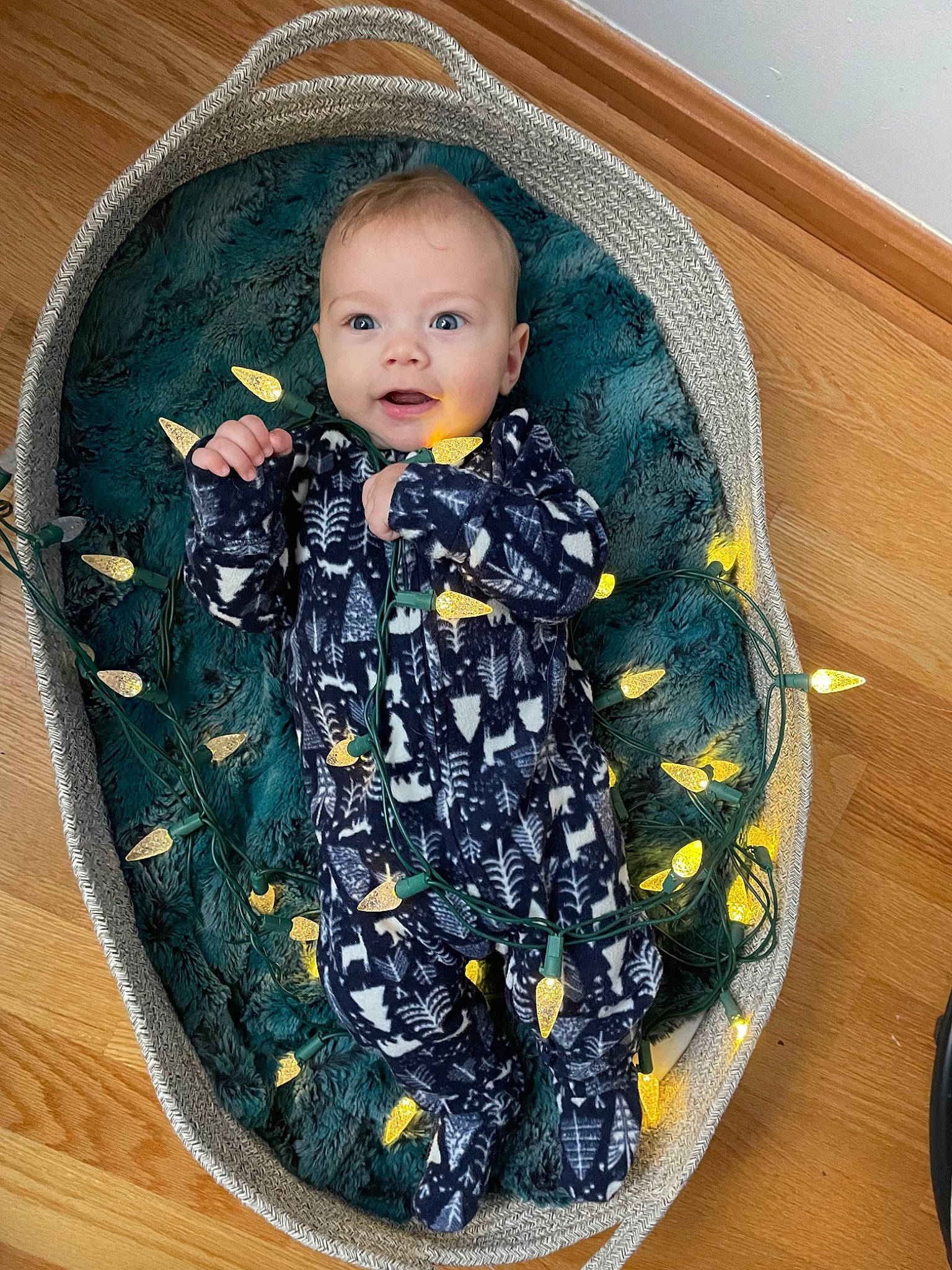 Leo is registered to the contest to win money with this photo: art, baby, baby_products, baby_toddler_clothing, baby_toys, cheek, child, clothing, doll, electric_blue, eye, fashion_accessory, head, outerwear, pattern, person, product, sleeve, textile, toy