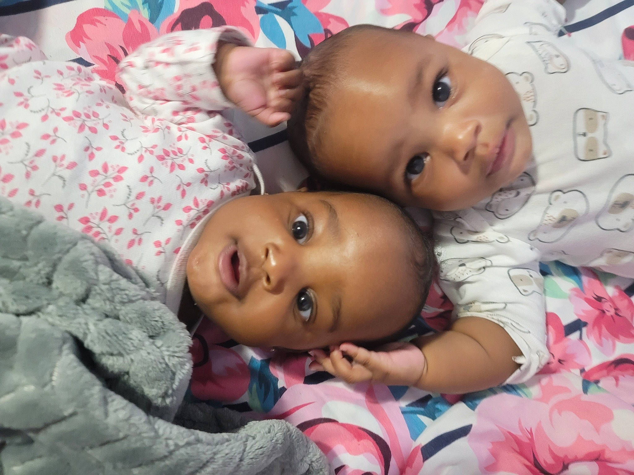Khalil is registered to the contest to win money with this photo: baby, baby_toddler_clothing, cheek, chin, eye, eyebrow, face, forehead, happy, head, human_body, iris, lip, mouth, nose, person, pink, skin, smile, textile