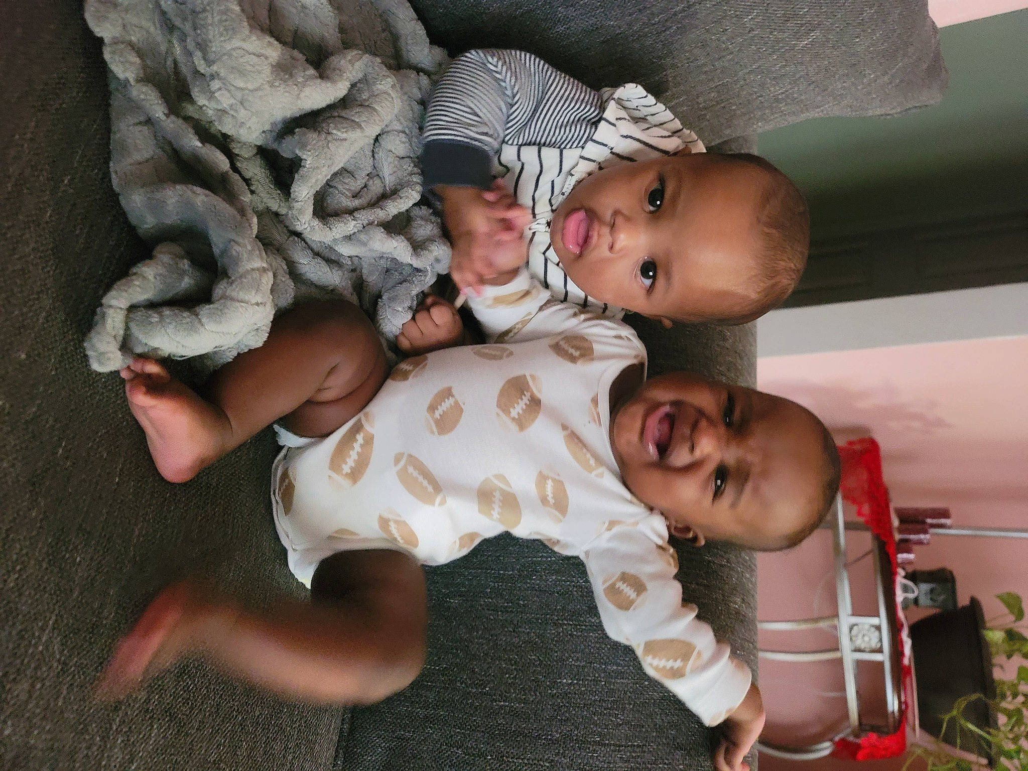 Khalil is registered to the contest to win money with this photo: abdomen, baby, baby_products, baby_toddler_clothing, cheek, child, fun, grass, happy, hat, mouth, person, plant, room, skin, smile, sorrow, toddler, tree, wood