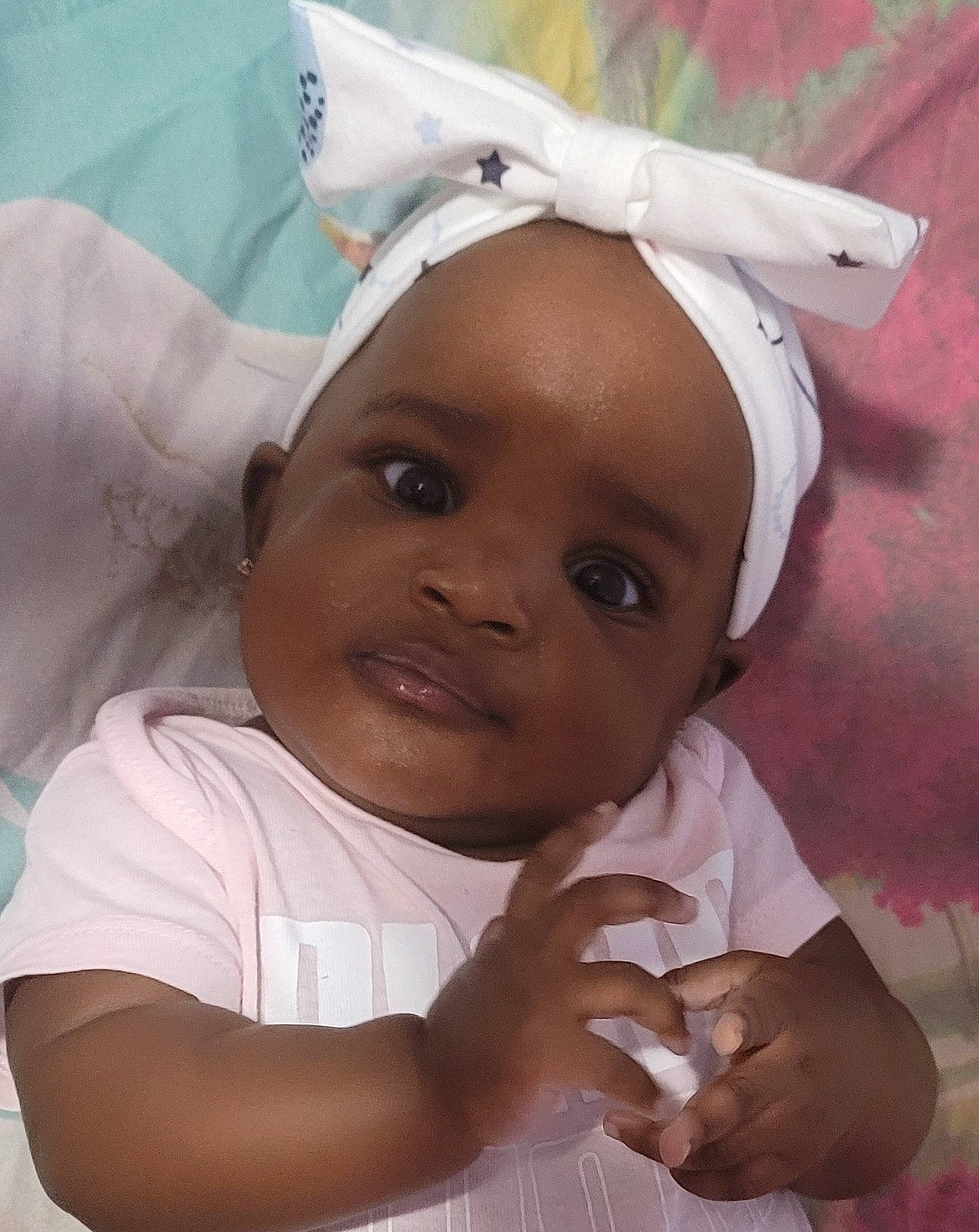 Kehlani is registered to the contest to win money with this photo: baby, baby_toddler_clothing, cheek, child, eyebrow, eyelash, fashion_accessory, fun, gesture, hair_accessory, hand, happy, lip, person, room, smile, thumb, toddler, white