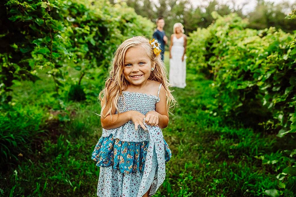 Mabel joined the competition — help win amazing prizes! baby_toddler_clothing, day_dress, dress, grass, grass_family, grassland, green, happy, joy, landscape, leisure, meadow, natural_landscape, people_in_nature, person, plant, rural_area, smile, summer, sunlight