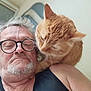 animal, beard, black_tank_top, blurred, casual, cat, chair, closeup, companion, facial_expression, ginger_cat, glasses, human, indoor, man, pet, selfie, shoulder, white_hair, window