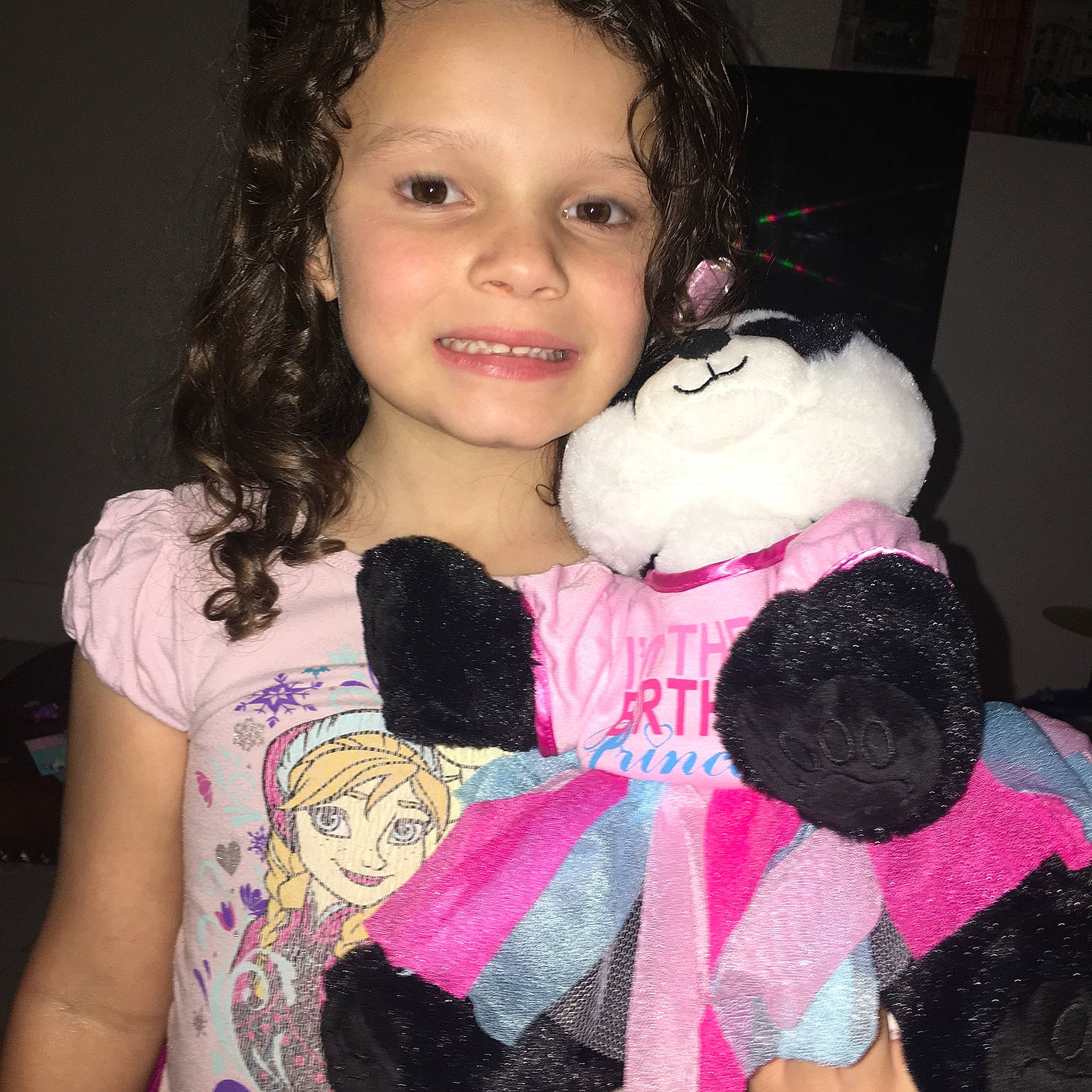 Katherine is registered to the contest to win money with this photo: baby_toddler_clothing, beauty, black, black_hair, cheek, eyelash, facial_expression, gesture, hair, happy, head, joy, lip, organ, person, pink, skin, sleeve, smile, toddler