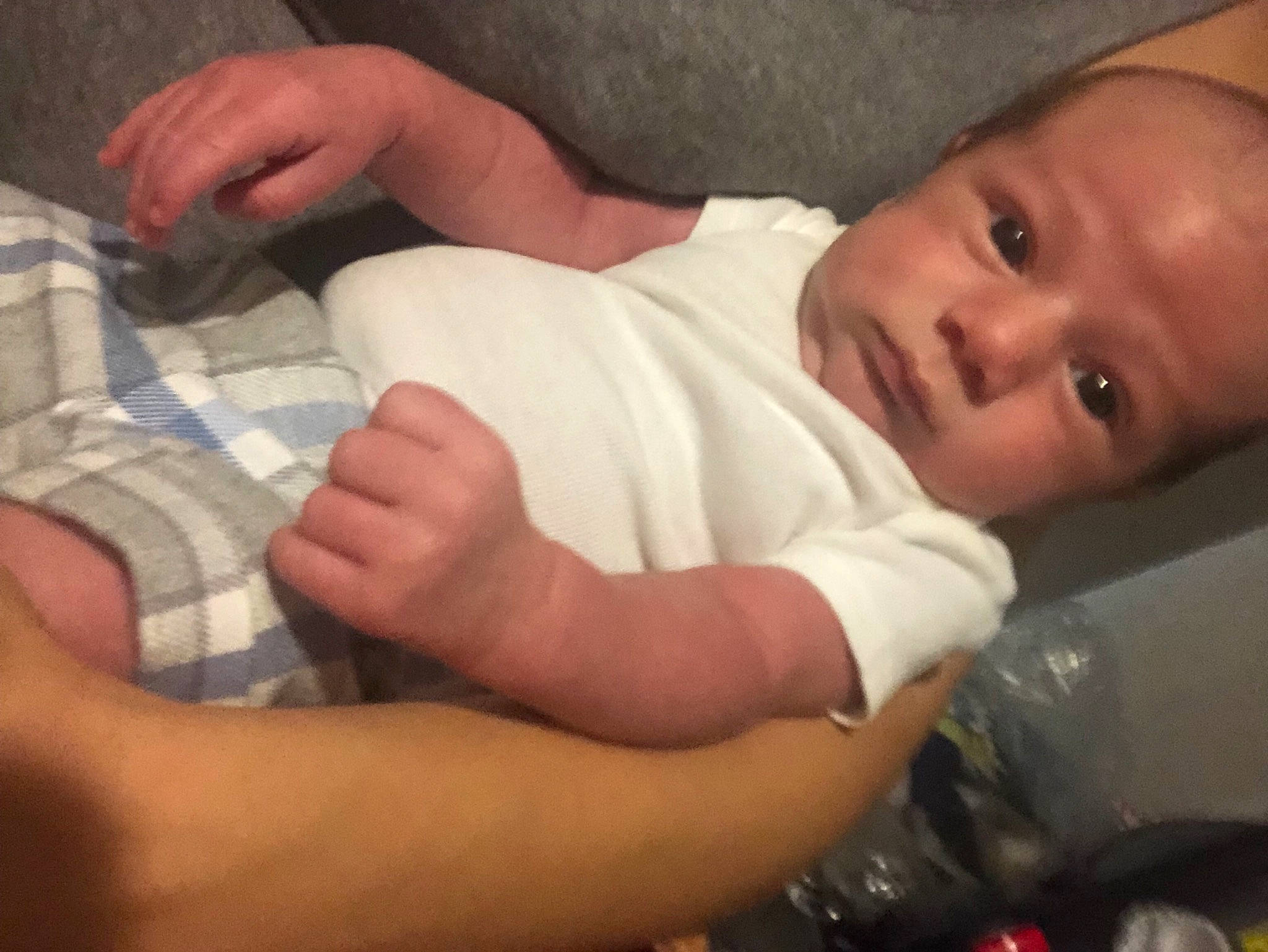 Emilio is registered to the contest to win money with this photo: baby, baby_products, baby_toddler_clothing, cheek, child, comfort, elbow, eye, finger, gesture, hand, human_body, mouth, nail, nose, person, skin, sleeve, thumb, toddler