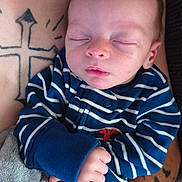 Zandyr joined the competition — help win amazing prizes! baby, newborn, sleeping, striped_clothing, blue, infant, tattoos, arm, hospital_wristband, blanket, hand, person, closeup, peaceful, cute, indoor, skin, resting, portrait, child
