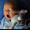 baby, blanket, blue, child, closeup, cozy, crocheted_toy, cute, hand, indoors, infant, newborn, peaceful, portrait, sleepy, soft_toy, teddy_bear, texture, wrapped, yawning