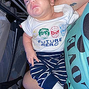 Ethan joined the competition — help win amazing prizes! baby, infant, child, portrait, sleepy, indoors, held, adult, stroller, clothing, onesie, superhero, marvel, future_hero, spiderman, hulk, captain_america, striped_pants, socks, tattoo