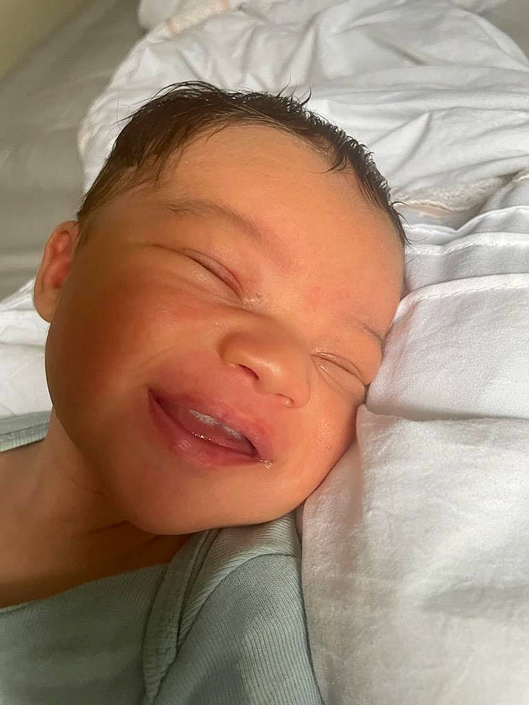 Cairo is registered to the contest to win money with this photo: baby, cheek, chin, comfort, ear, eyebrow, eyelash, finger, forehead, iris, jaw, lip, mouth, neck, nose, person, skin, smile, textile, thumb