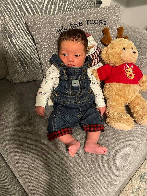 Cairo joined the competition — help win amazing prizes! baby, baby_toddler_clothing, barefoot, child, comfort, couch, foot, fur, head, linens, pattern, person, plush, sitting, sleeve, stuffed_toy, teddy_bear, toddler, toy, wood